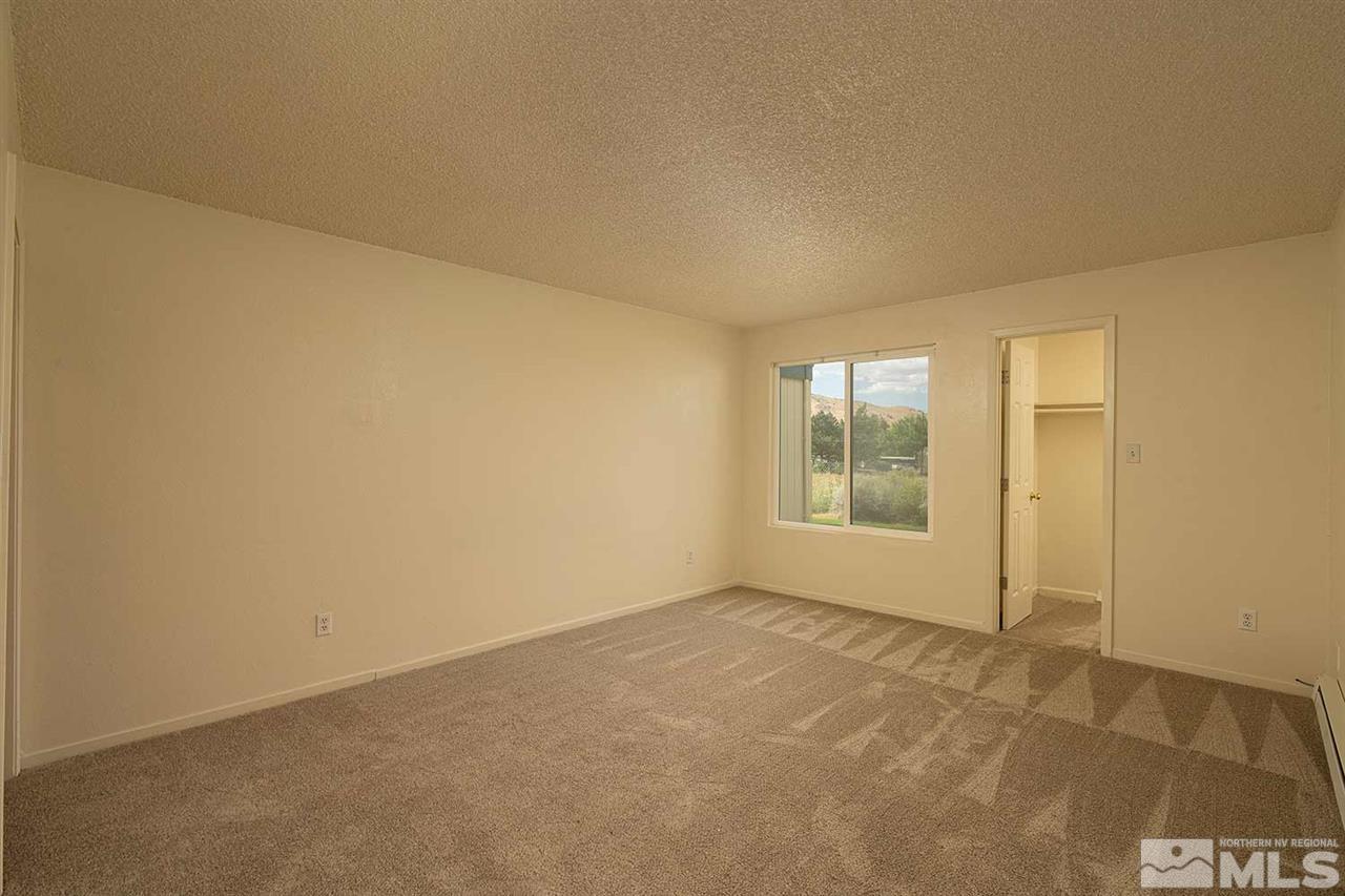 3915 Clear Acre Lane, Unit 149 Reno, NV 89512 - Photo 13 of 21 a view of an empty room with a window
