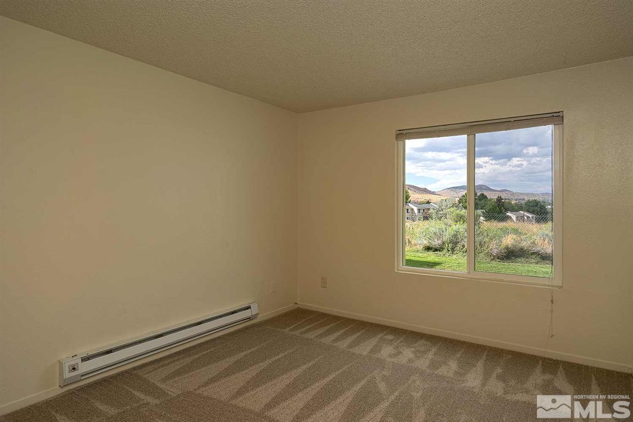 3915 Clear Acre Lane, Unit 149 Reno, NV 89512 - Photo 14 of 21 an empty room with a window