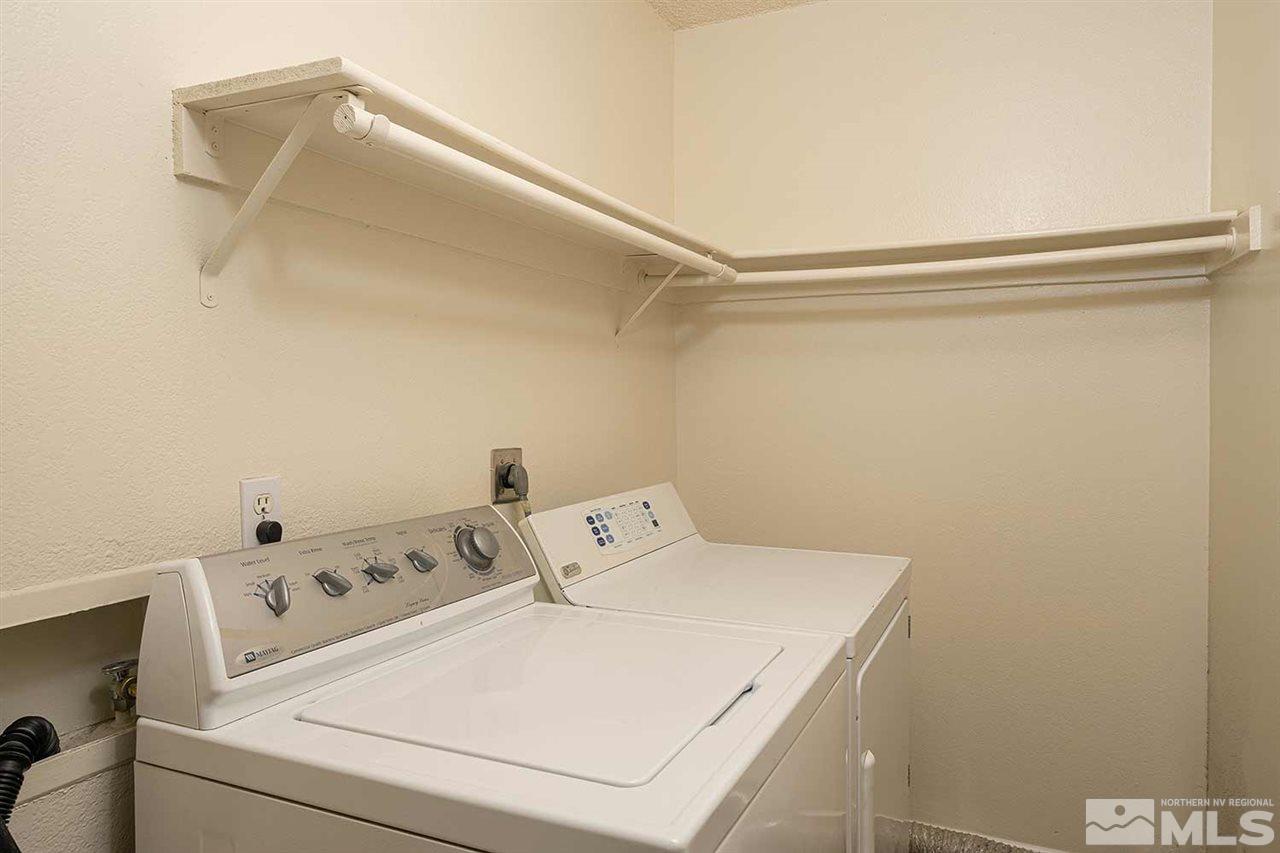 3915 Clear Acre Lane, Unit 149 Reno, NV 89512 - Photo 16 of 21 a utility room with dryer and washer