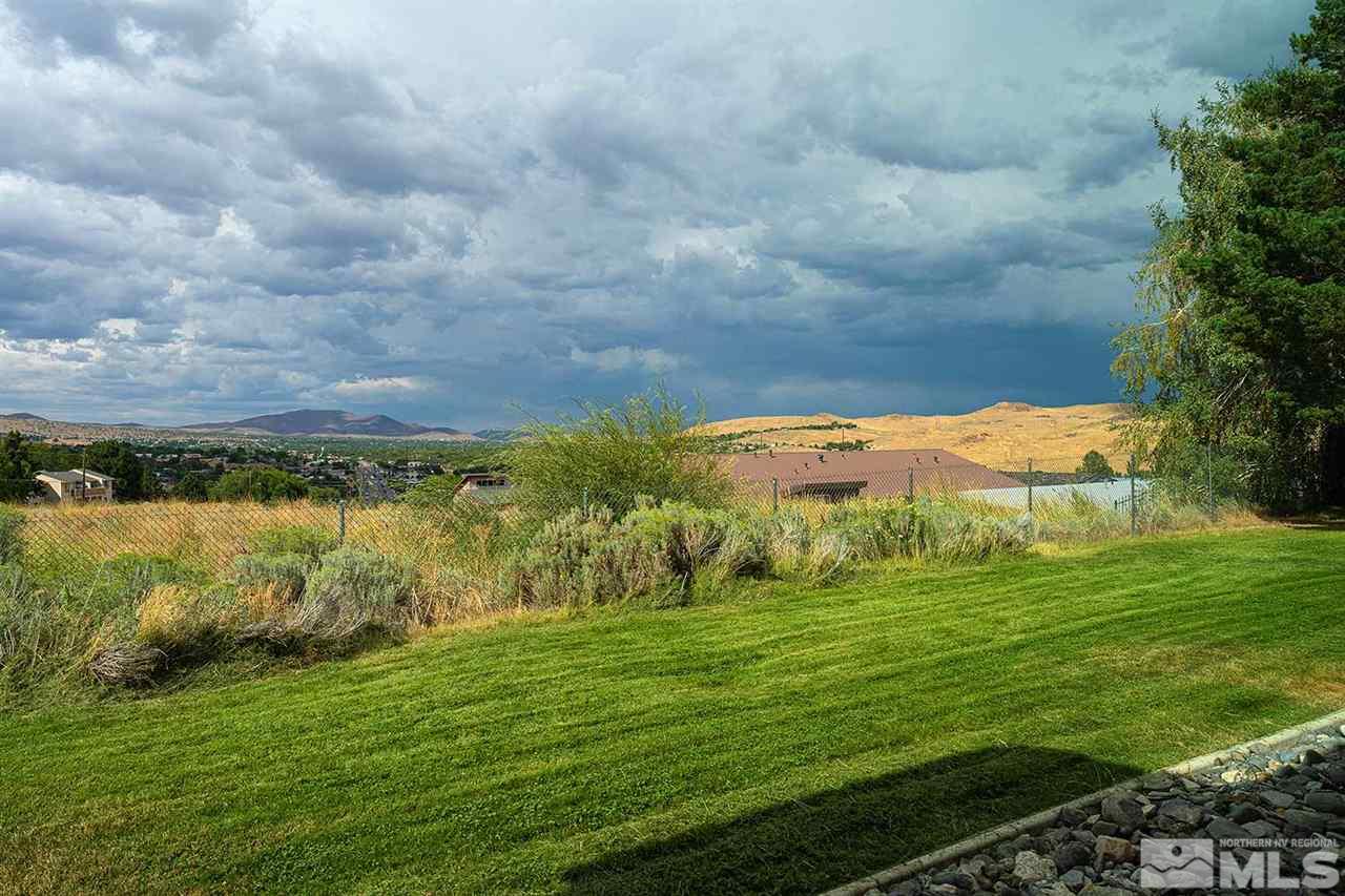 3915 Clear Acre Lane, Unit 149 Reno, NV 89512 - Photo 19 of 21 a view of a field with an ocean