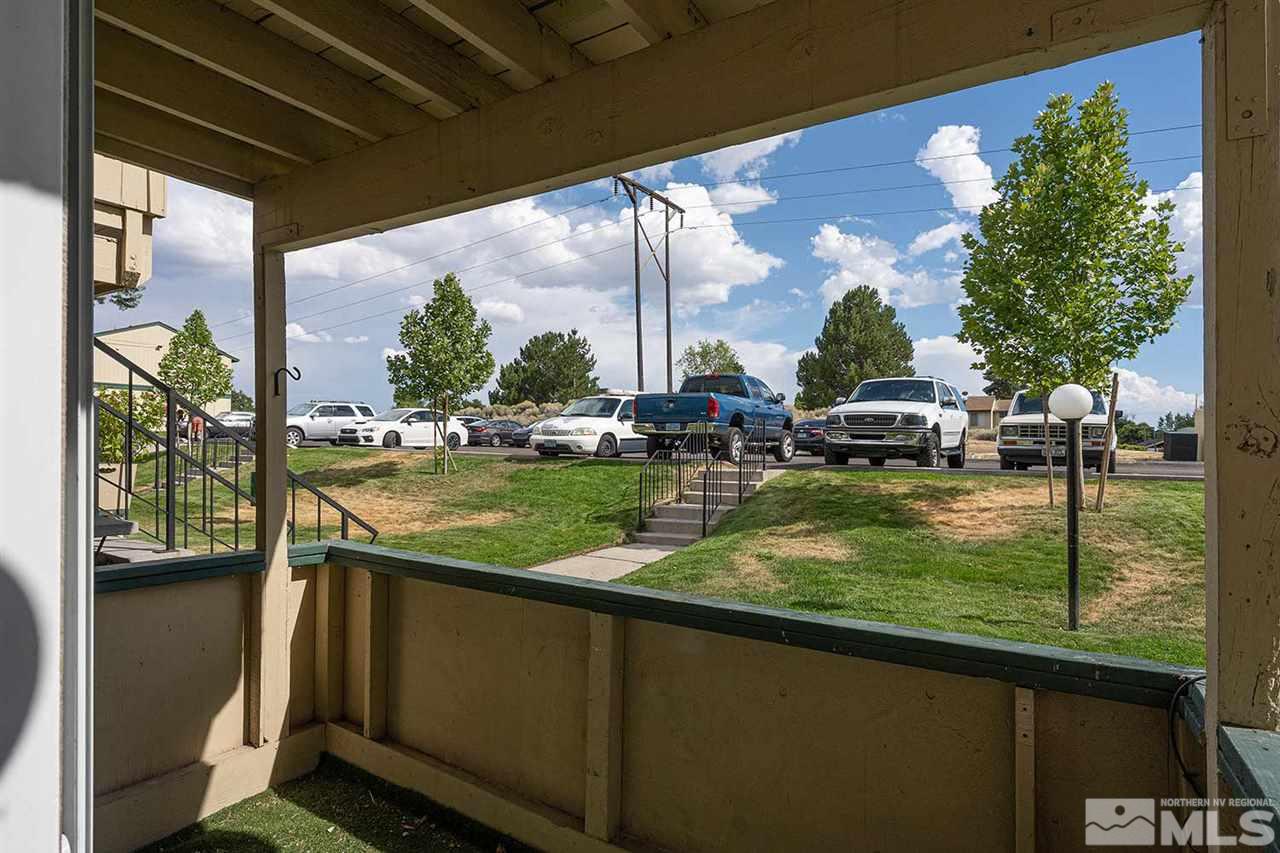 3915 Clear Acre Lane, Unit 149 Reno, NV 89512 - Photo 20 of 21 a view of swimming pool from a balcony