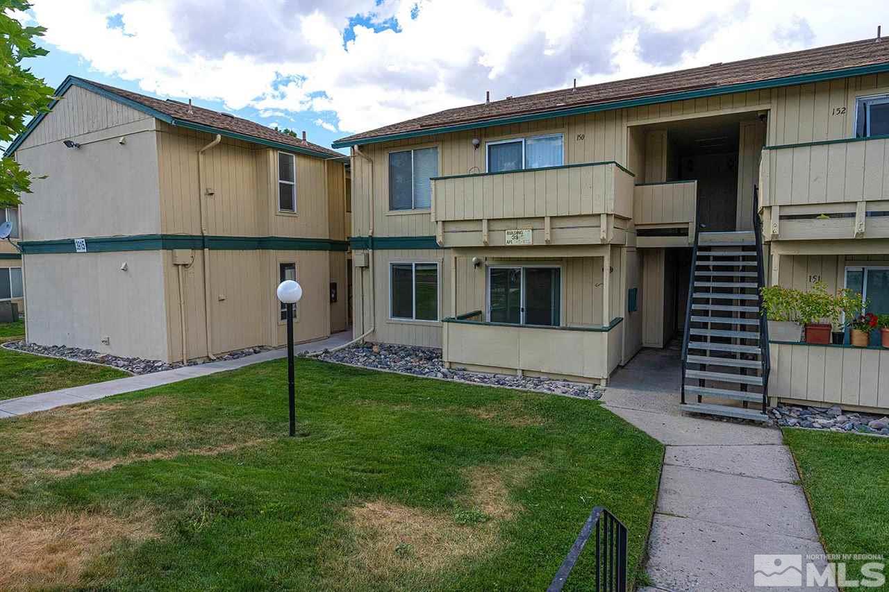 3915 Clear Acre Lane, Unit 149 Reno, NV 89512 - Photo 21 of 21 a house that has a big yard in front of it