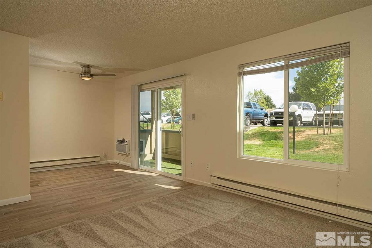 3915 Clear Acre Lane, Unit 149 Reno, NV 89512 - Photo 5 of 21 a view of an empty room with a window