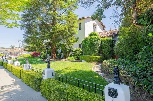 a living room with furniture fireplace and window
