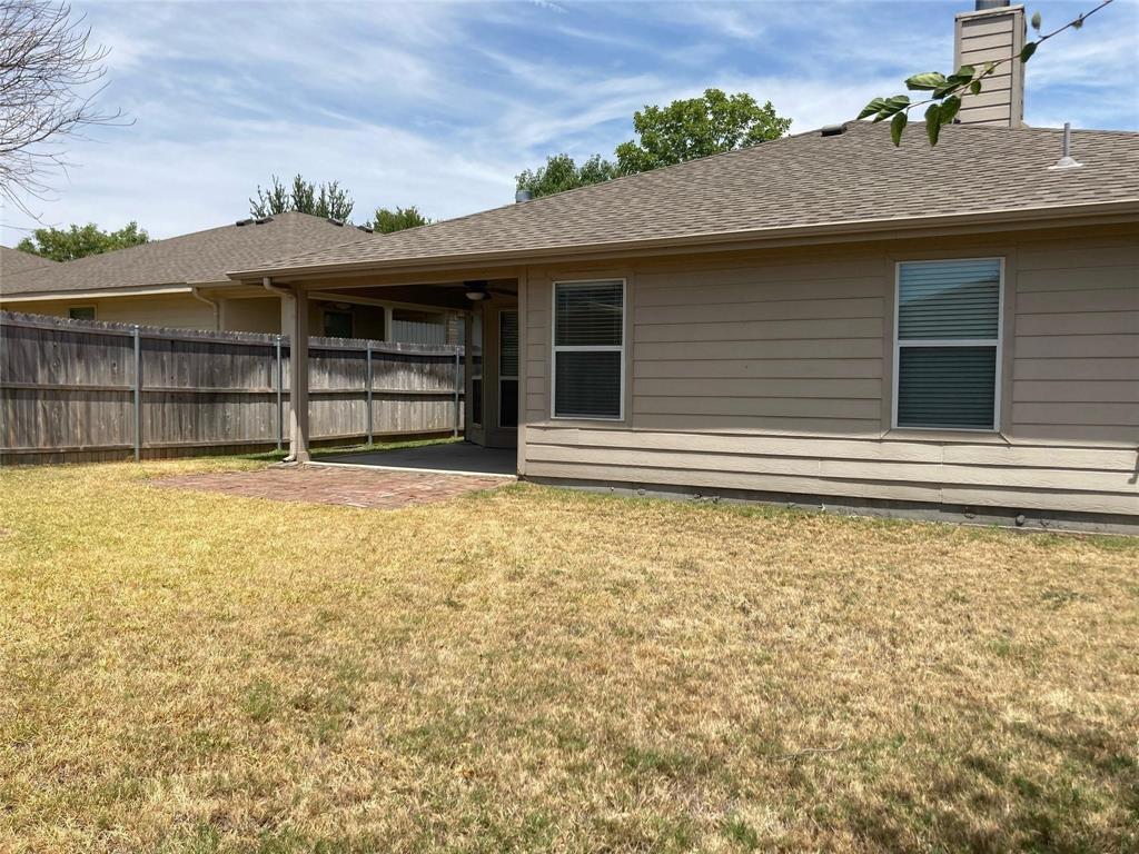717 Mahogany Drive Anna, TX 75409 - Photo 9 of 11 a house view with a backyard space