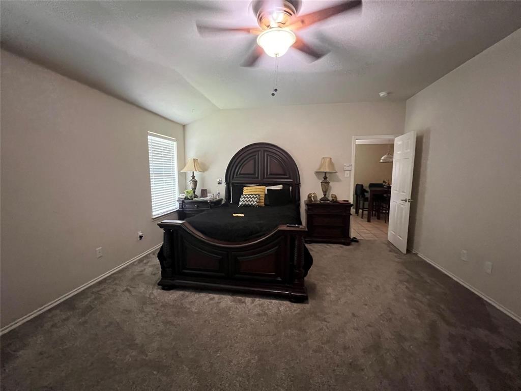 717 Mahogany Drive Anna, TX 75409 - Photo 3 of 11 a living room with furniture and a ceiling fan