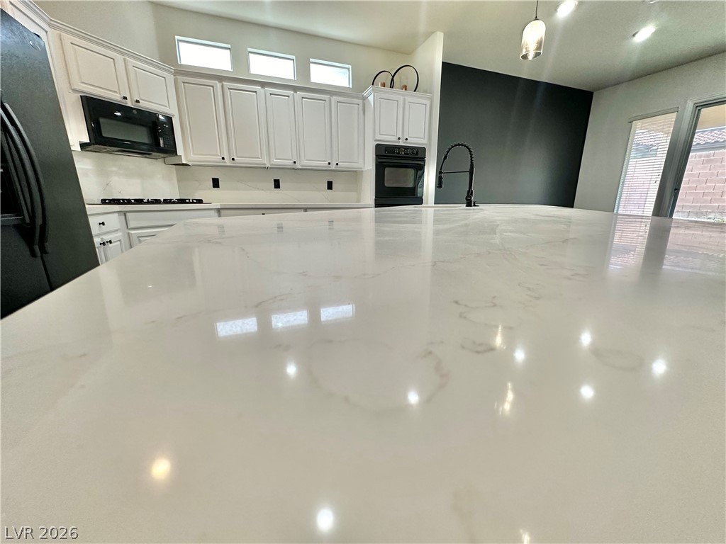 9996 Liberty View Road Las Vegas, NV 89148 - Photo 17 of 64 KITCHEN ISLAND OVER 13 FEET LONG