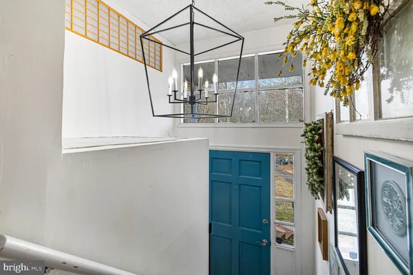 a view of entryway with a front door