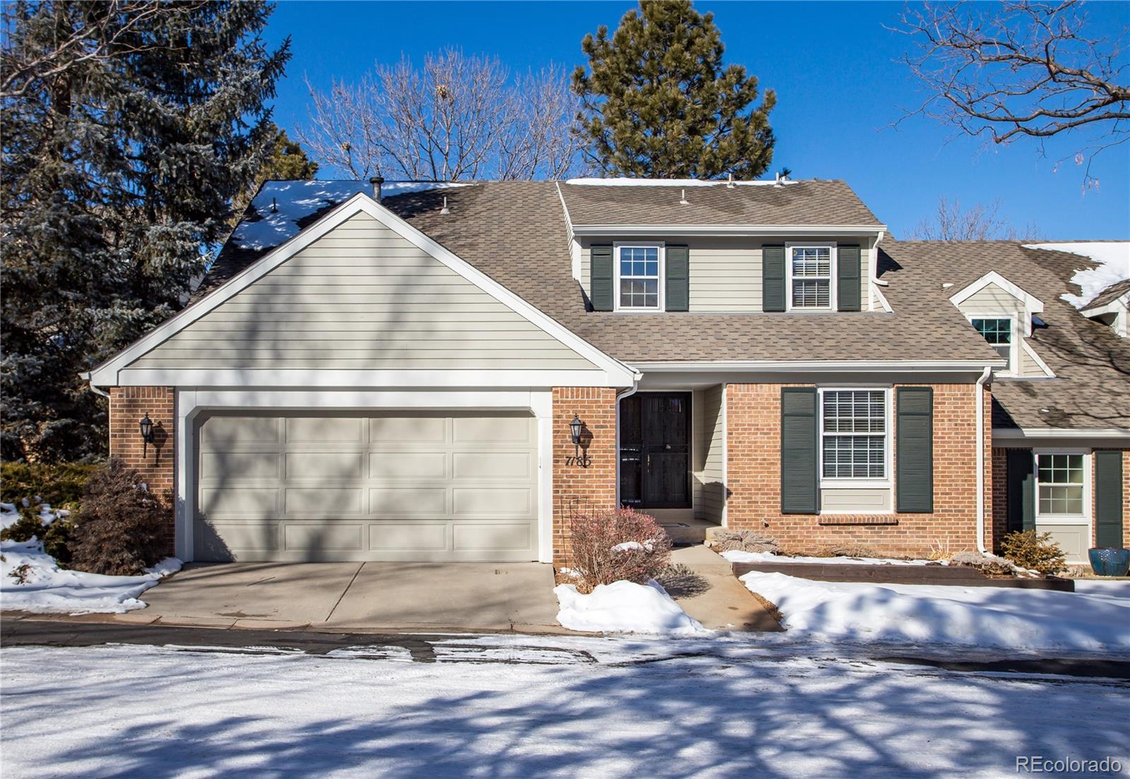 7185 Poplar Way Centennial, CO 80112 - Photo 1 of 34 a front view of a house