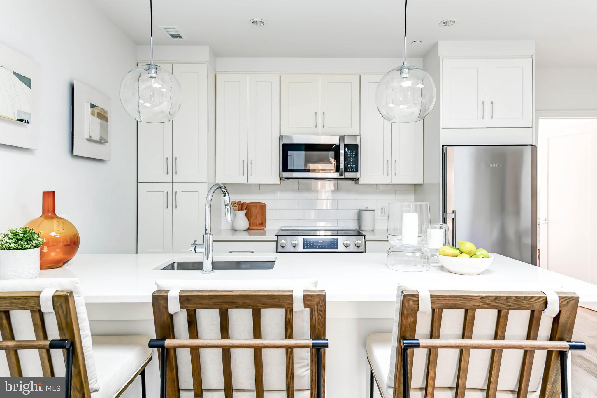 1357 Nicholson Street Northwest, Unit 6 Washington, DC 20011 - Photo 4 of 31 Beautiful Quartz Breakfast Bar w Pendant Lighting