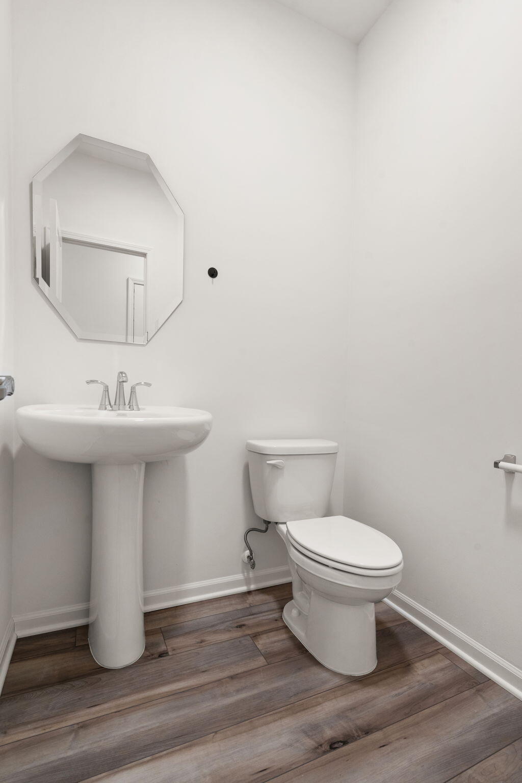 1811 East 111th Place Crown Point, IN 46307 - Photo 16 of 35 a bathroom with a sink toilet and a mirror