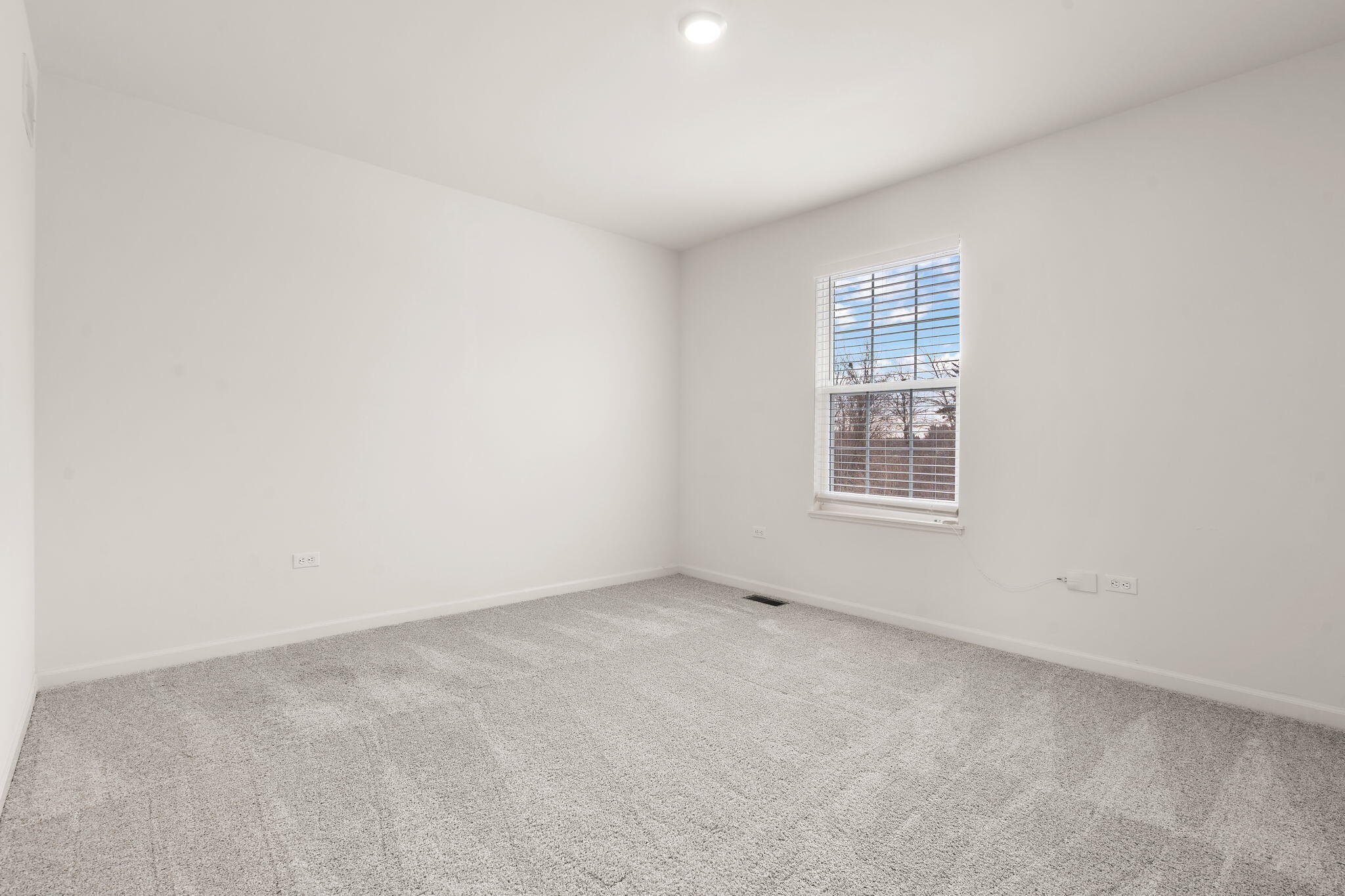 1811 East 111th Place Crown Point, IN 46307 - Photo 23 of 35 an empty room with windows