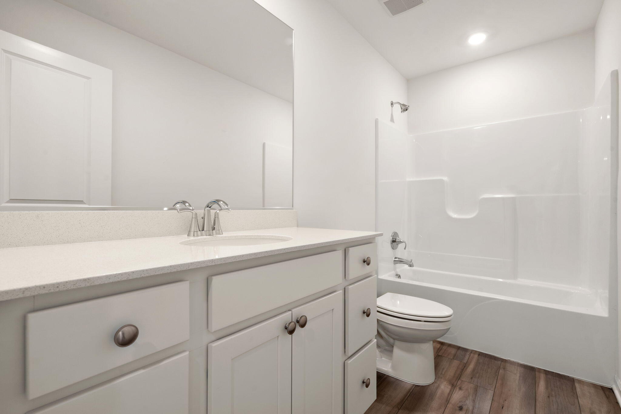 1811 East 111th Place Crown Point, IN 46307 - Photo 26 of 35 a bathroom with a sink a toilet and shower