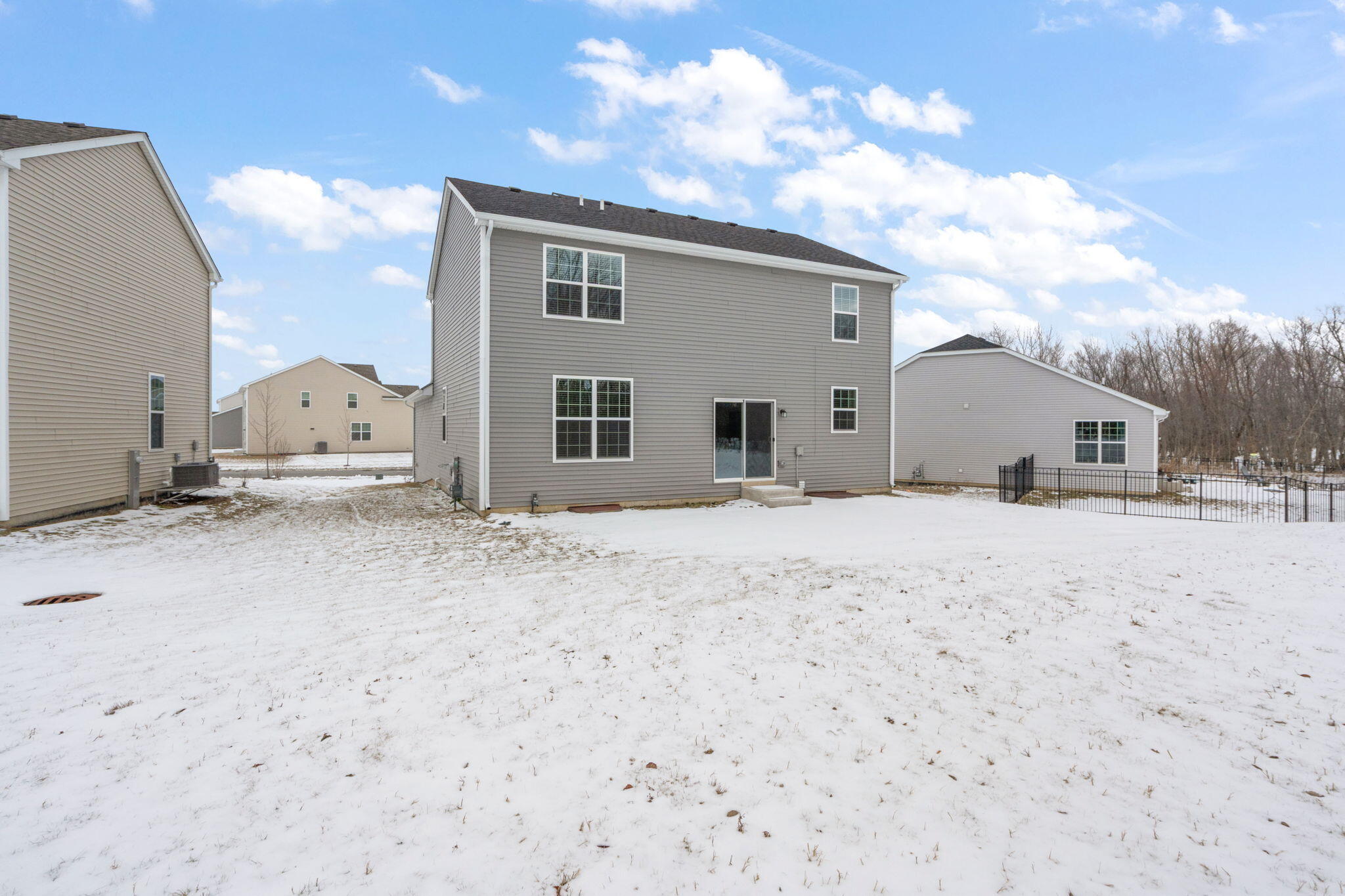 1811 East 111th Place Crown Point, IN 46307 - Photo 34 of 35 a view of a house with a snow in the yard