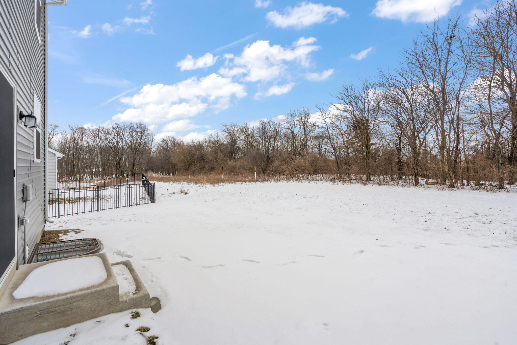 1811 East 111th Place Crown Point, IN 46307 - Photo 35 of 35 a view of outdoor space yard and snow