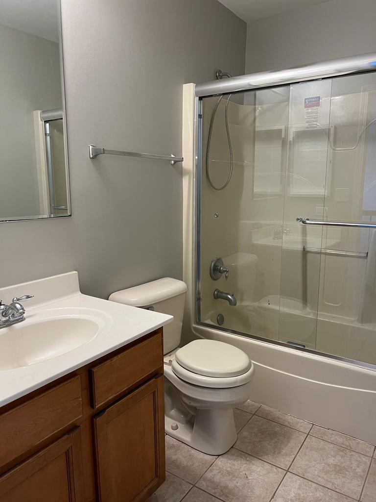 364 Risen Star Lane, Unit 364 Oswego, IL 60543 - Photo 12 of 15 a bathroom with a sink toilet and shower