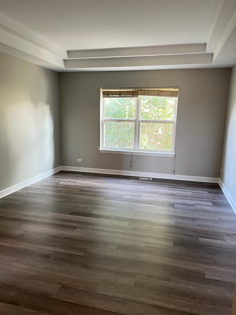 364 Risen Star Lane, Unit 364 Oswego, IL 60543 - Photo 4 of 15 a view of room with window and hardwood floor