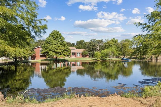 a view of a lake in front of house