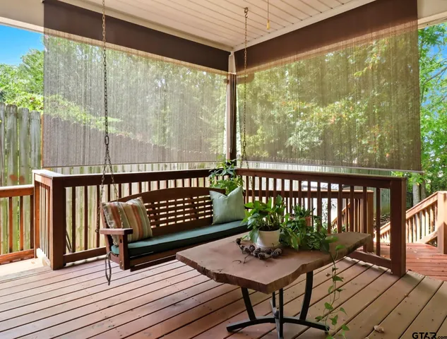 a view of a chairs on the roof deck