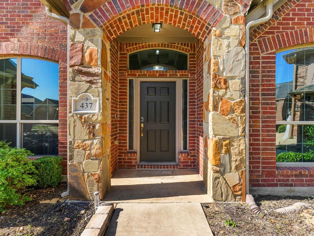 437 Hackworth Street Roanoke, TX 76262 - Photo 3 of 35 a front view of a house with a yard