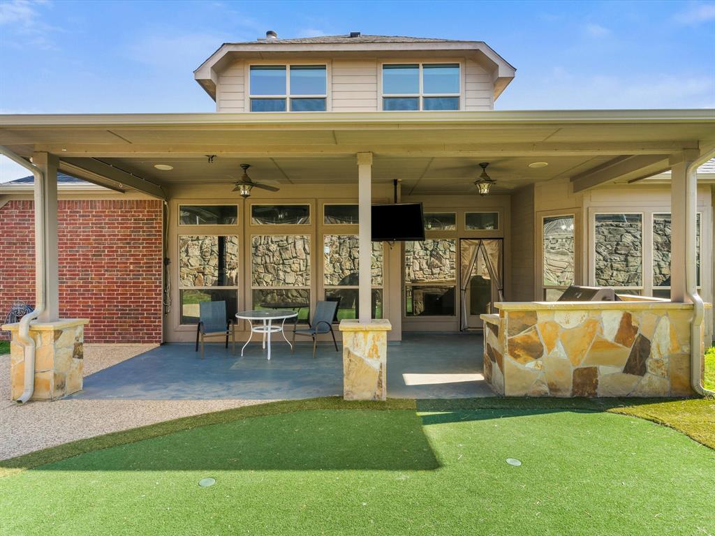 437 Hackworth Street Roanoke, TX 76262 - Photo 32 of 35 a view of a house with patio