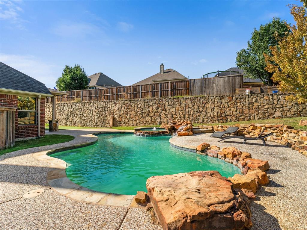 437 Hackworth Street Roanoke, TX 76262 - Photo 35 of 35 a front view of a house with garden