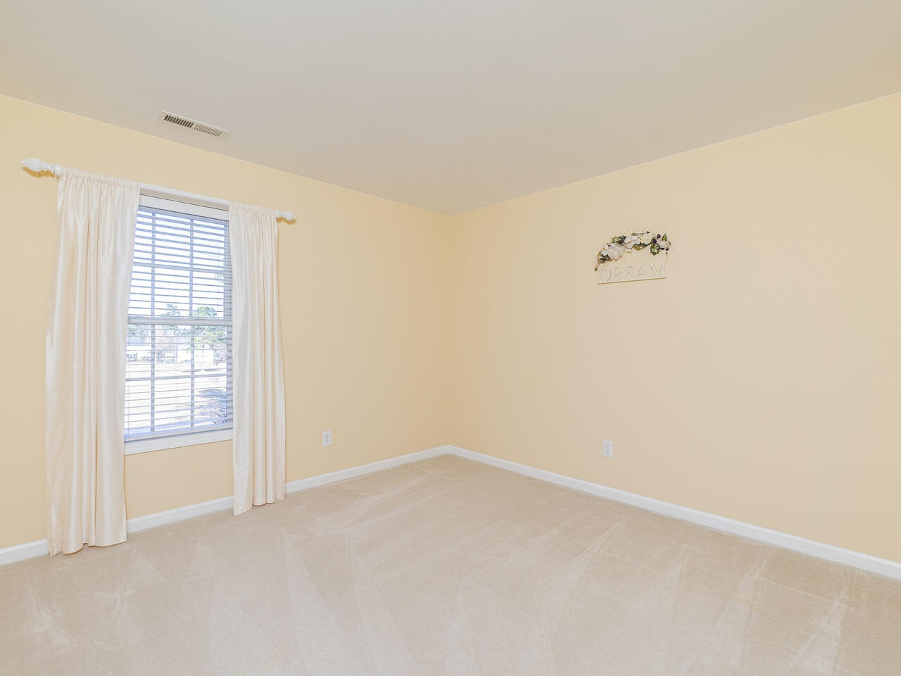 426 Seastone Street Raleigh, NC 27603 - Photo 21 of 30 an empty room with windows