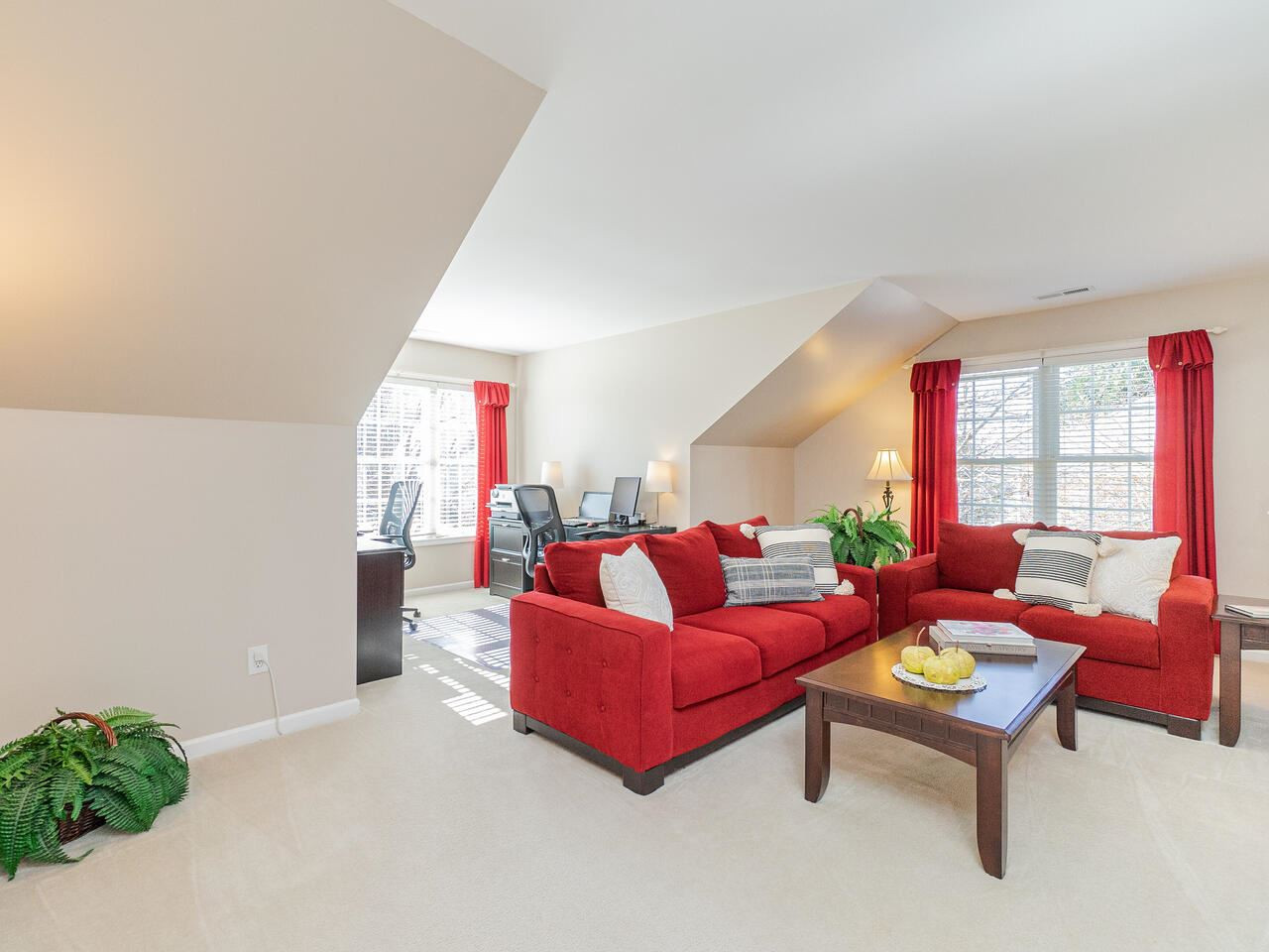 426 Seastone Street Raleigh, NC 27603 - Photo 23 of 30 a living room with furniture and a large window