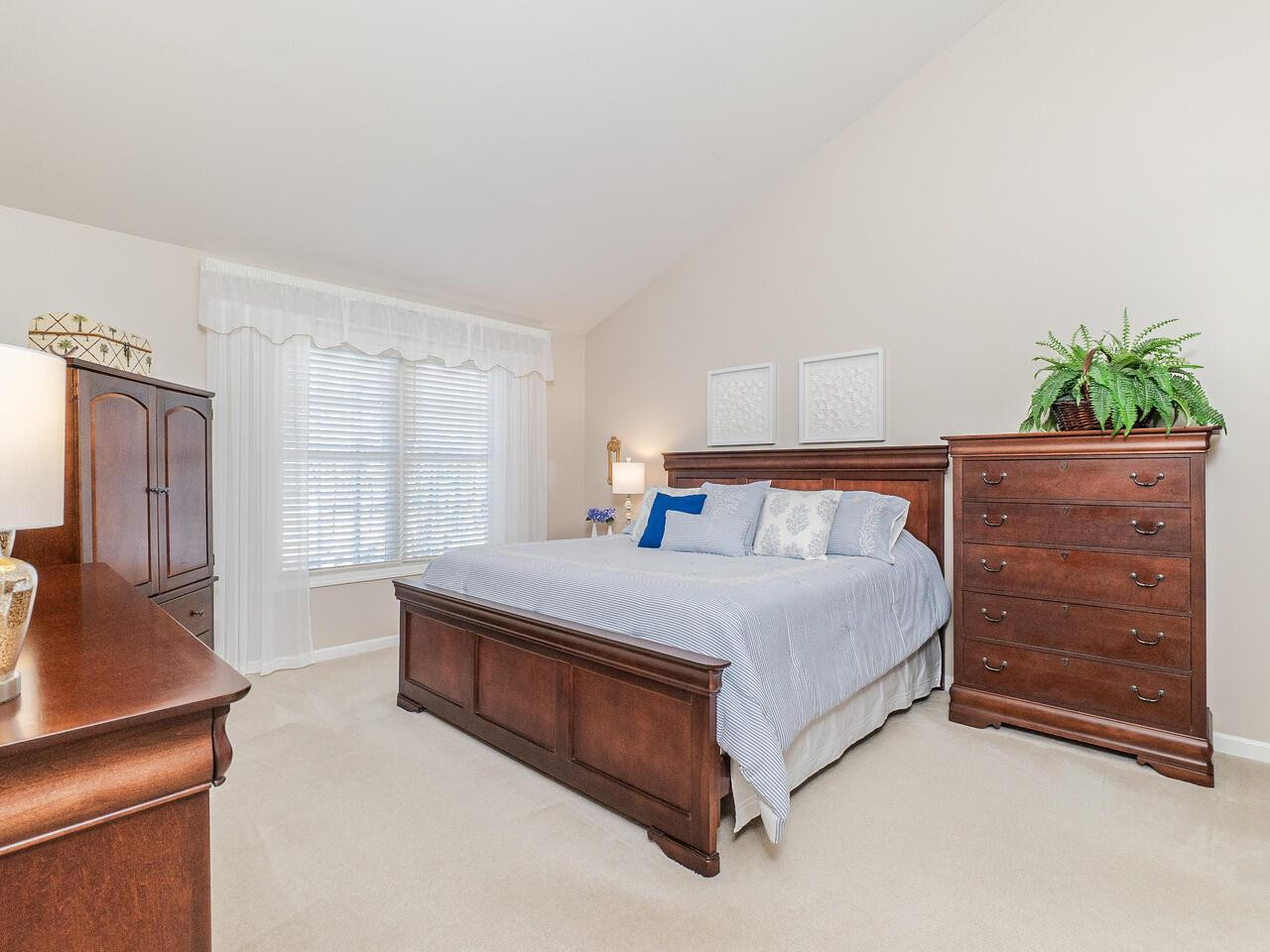 426 Seastone Street Raleigh, NC 27603 - Photo 24 of 30 a bedroom with a bed and with furniture