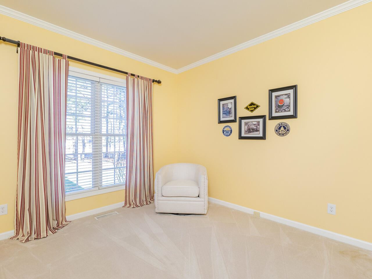 426 Seastone Street Raleigh, NC 27603 - Photo 25 of 30 a living room with a couch and a large window
