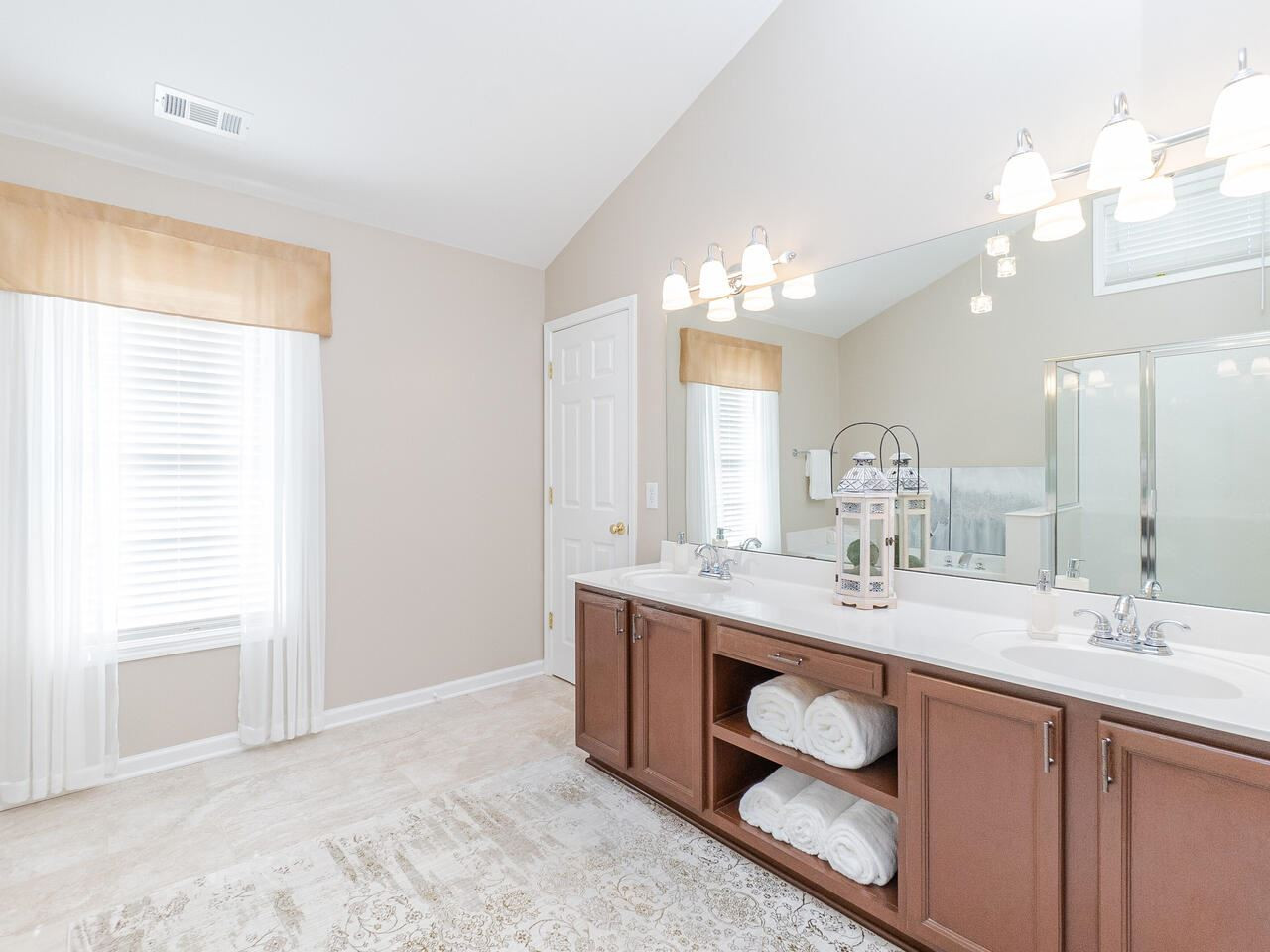426 Seastone Street Raleigh, NC 27603 - Photo 26 of 30 a bathroom with a sink double vanity and a mirror