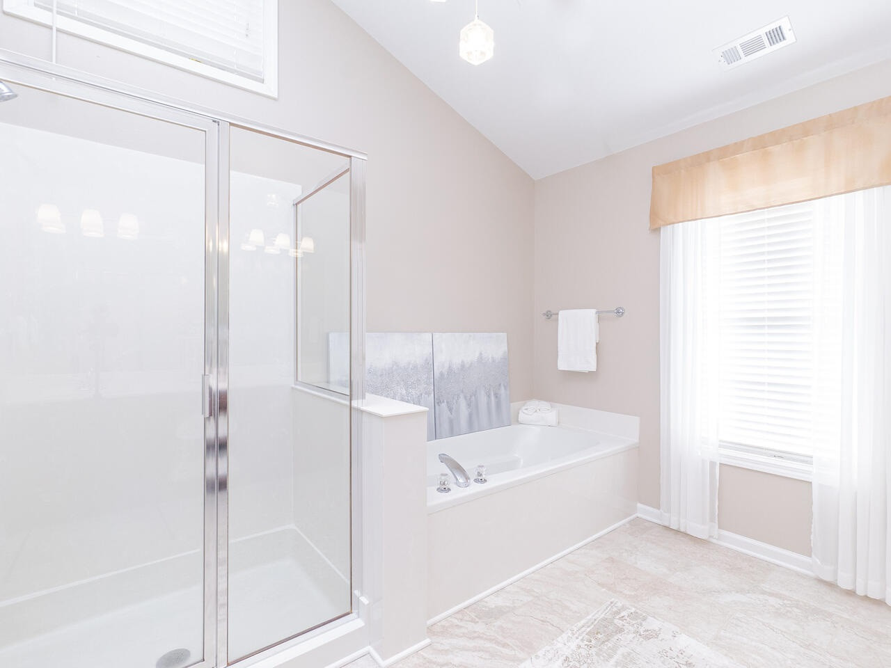 426 Seastone Street Raleigh, NC 27603 - Photo 27 of 30 a bathroom with a bathtub and a shower