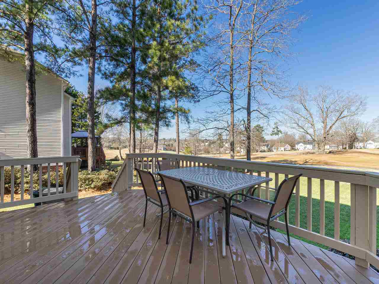 426 Seastone Street Raleigh, NC 27603 - Photo 30 of 30 a patio with wooden floor and outdoor seating
