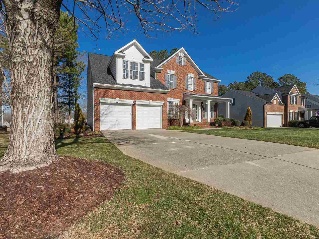 426 Seastone Street Raleigh, NC 27603 - Photo 3 of 30 a front view of a house with a yard