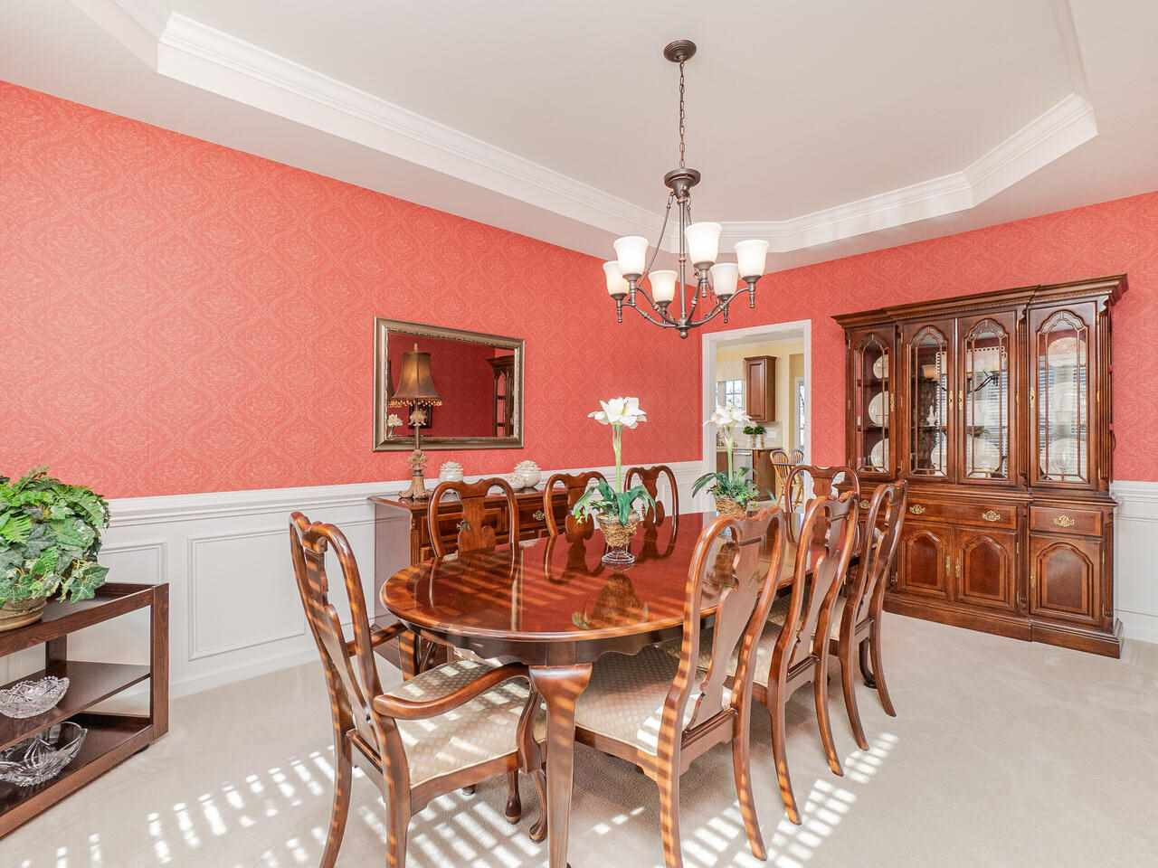426 Seastone Street Raleigh, NC 27603 - Photo 7 of 30 a view of a dining room with furniture and chandelier