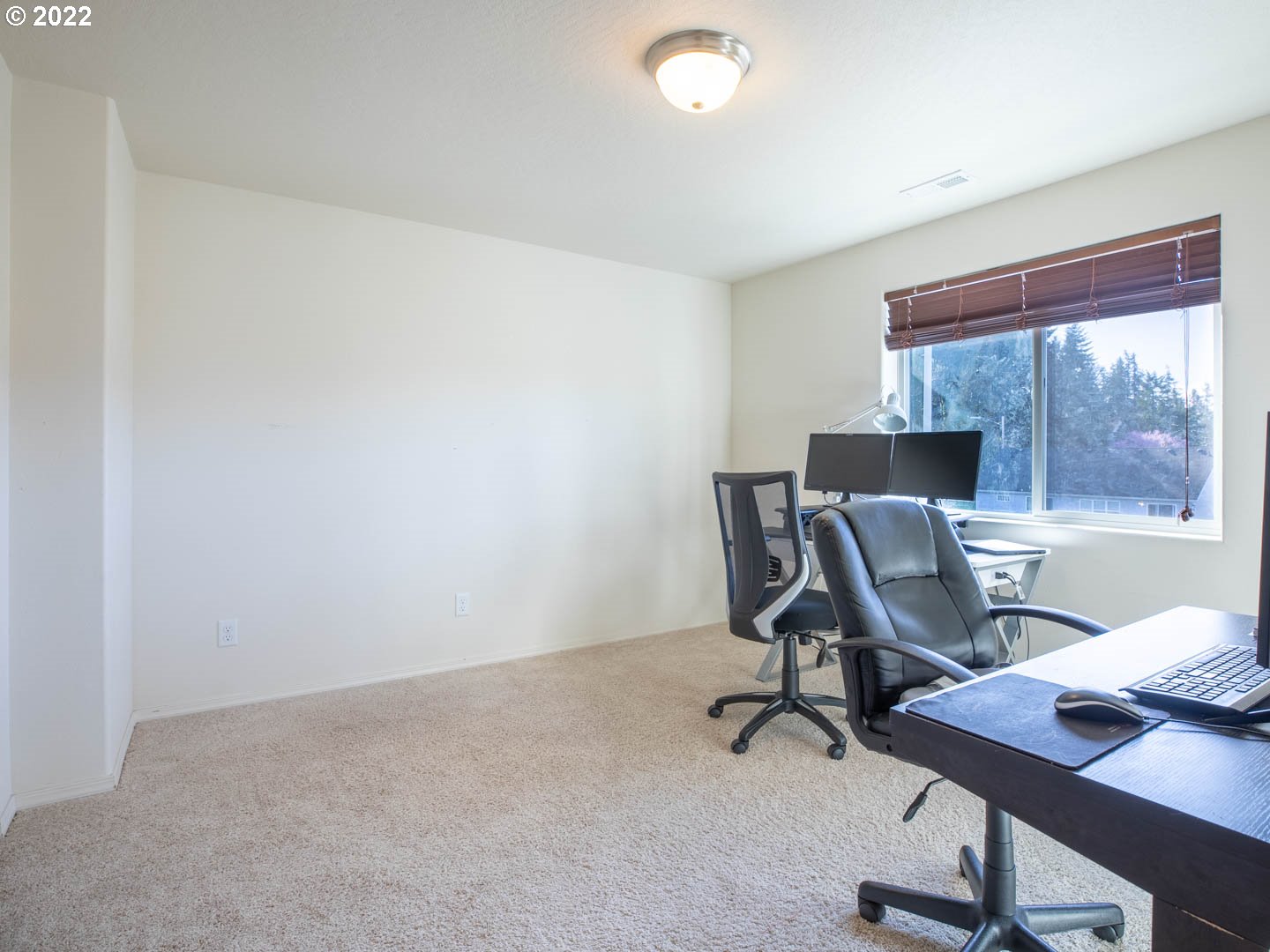 4664 Rocky Road Springfield, OR 97478 - Photo 14 of 21 a view of a workspace with furniture and a window