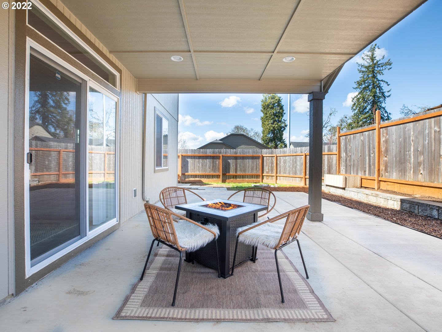 4664 Rocky Road Springfield, OR 97478 - Photo 18 of 21 a dining room with a glass top table and chairs