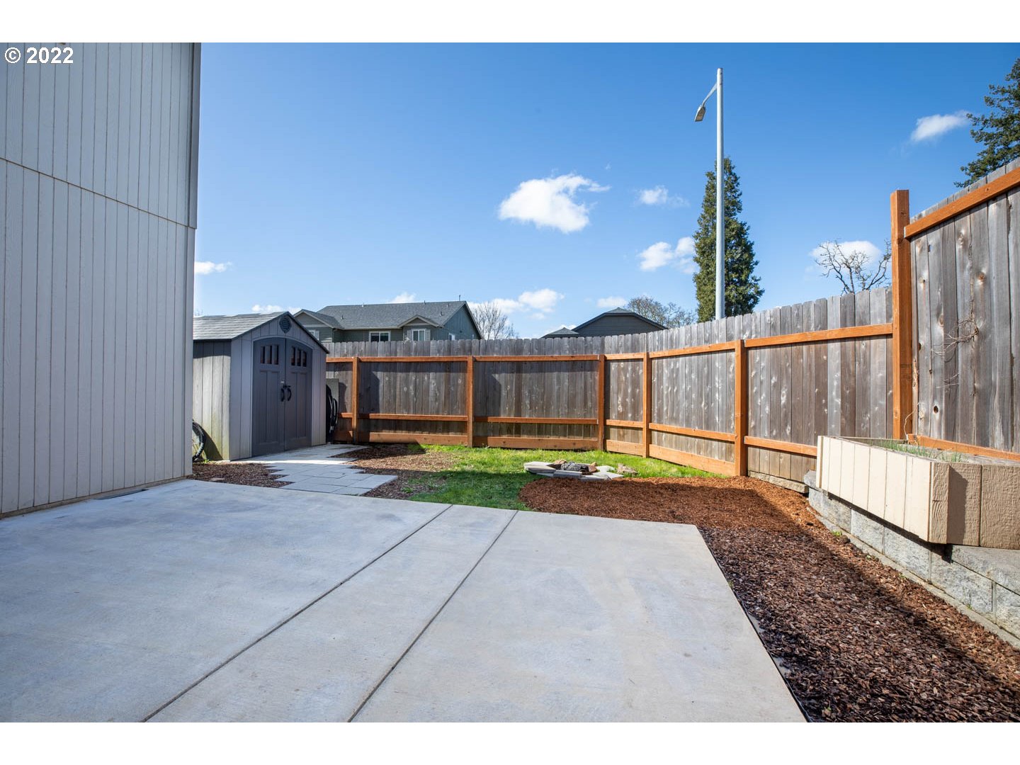 4664 Rocky Road Springfield, OR 97478 - Photo 19 of 21 a view of a house with backyard and sitting area