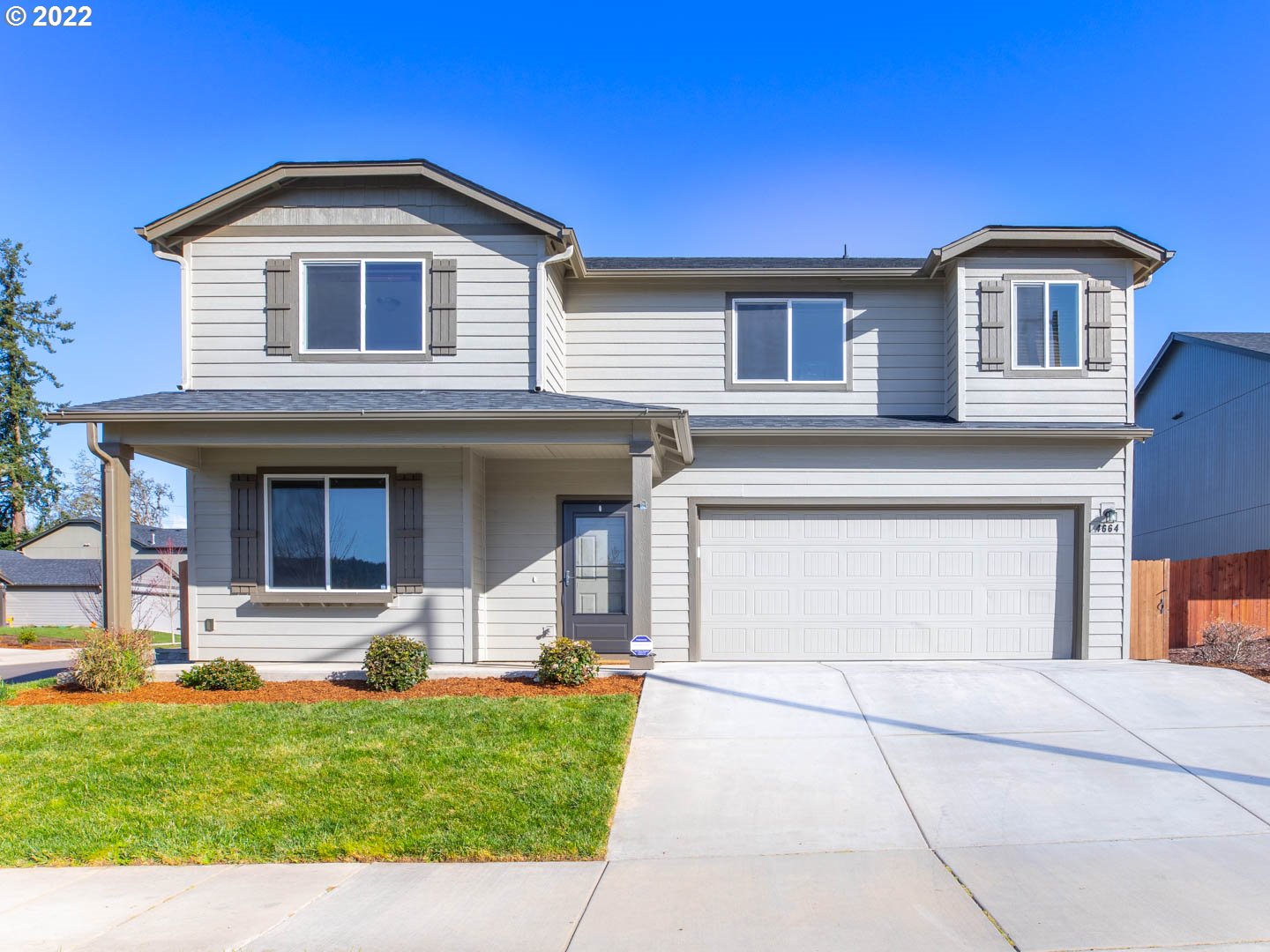 4664 Rocky Road Springfield, OR 97478 - Photo 2 of 21 a front view of a house with a yard