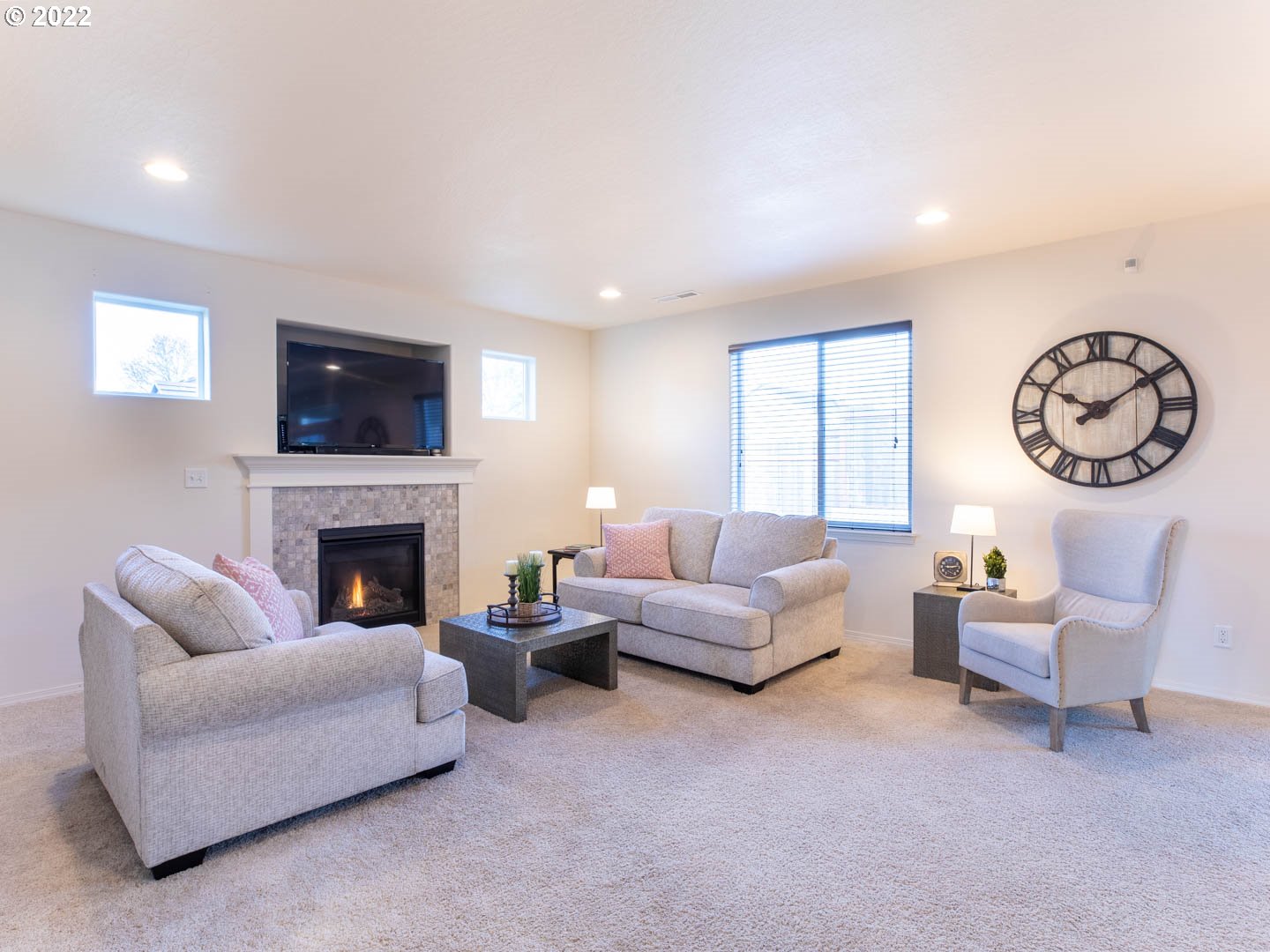 4664 Rocky Road Springfield, OR 97478 - Photo 3 of 21 a living room with furniture a fireplace and a flat screen tv