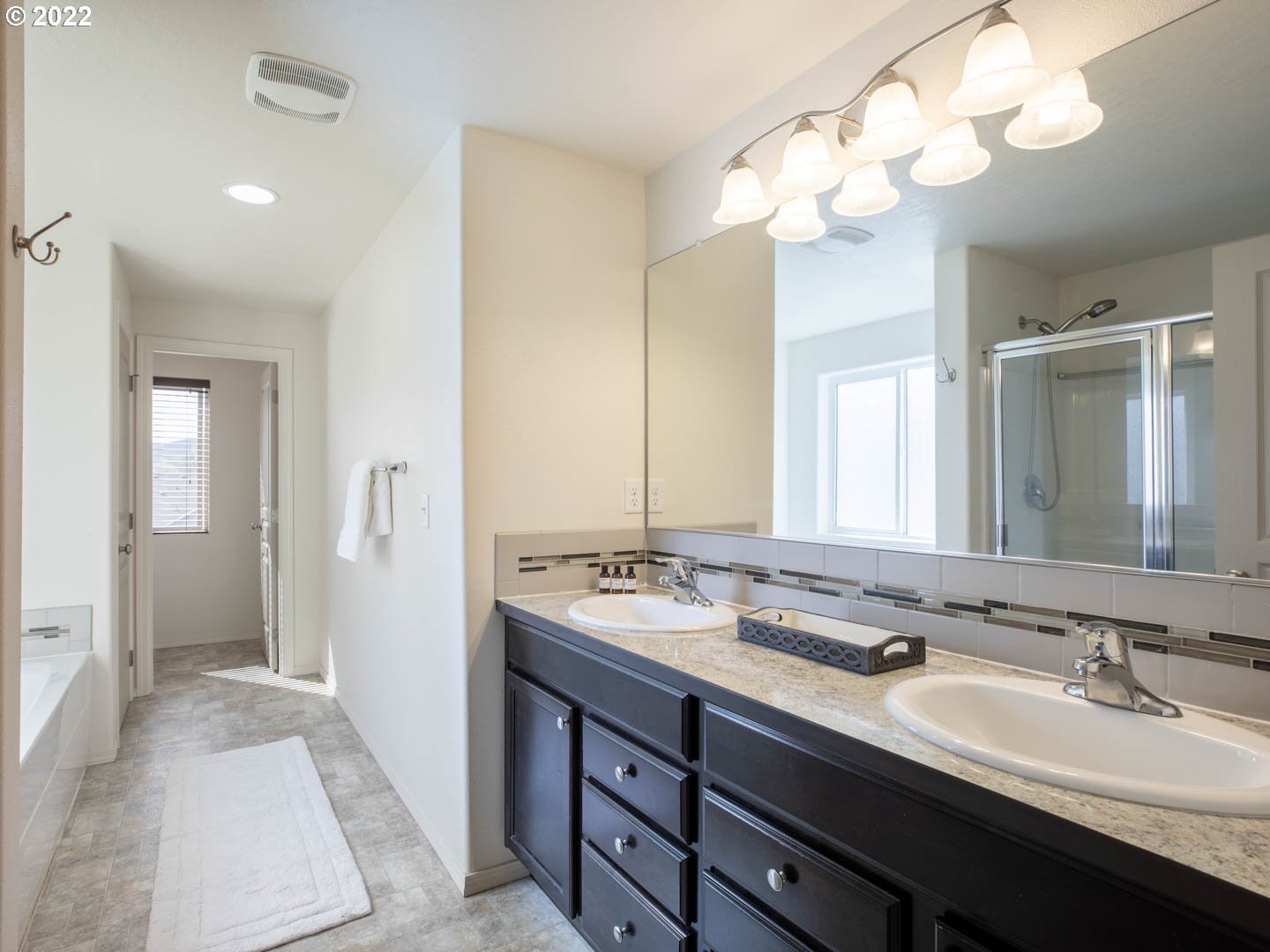 4664 Rocky Road Springfield, OR 97478 - Photo 10 of 21 a bathroom with a sink double vanity and a mirror