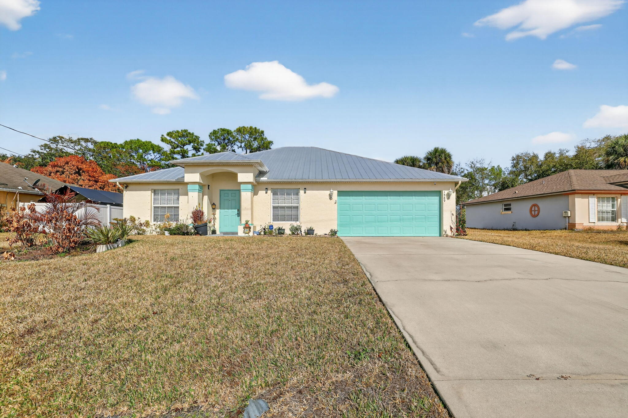 1589 Southwest Fortune Road Port St. Lucie, FL 34953 - Photo 1 of 49 Front