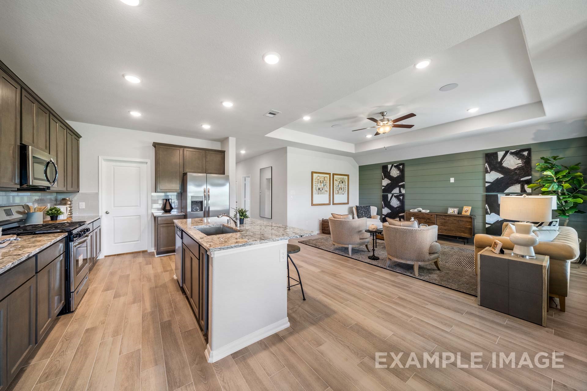 3311 Hidden Mist Drive Texas City, TX 77510 - Photo 11 of 37 a large living room with stainless steel appliances granite countertop lots of counter top space