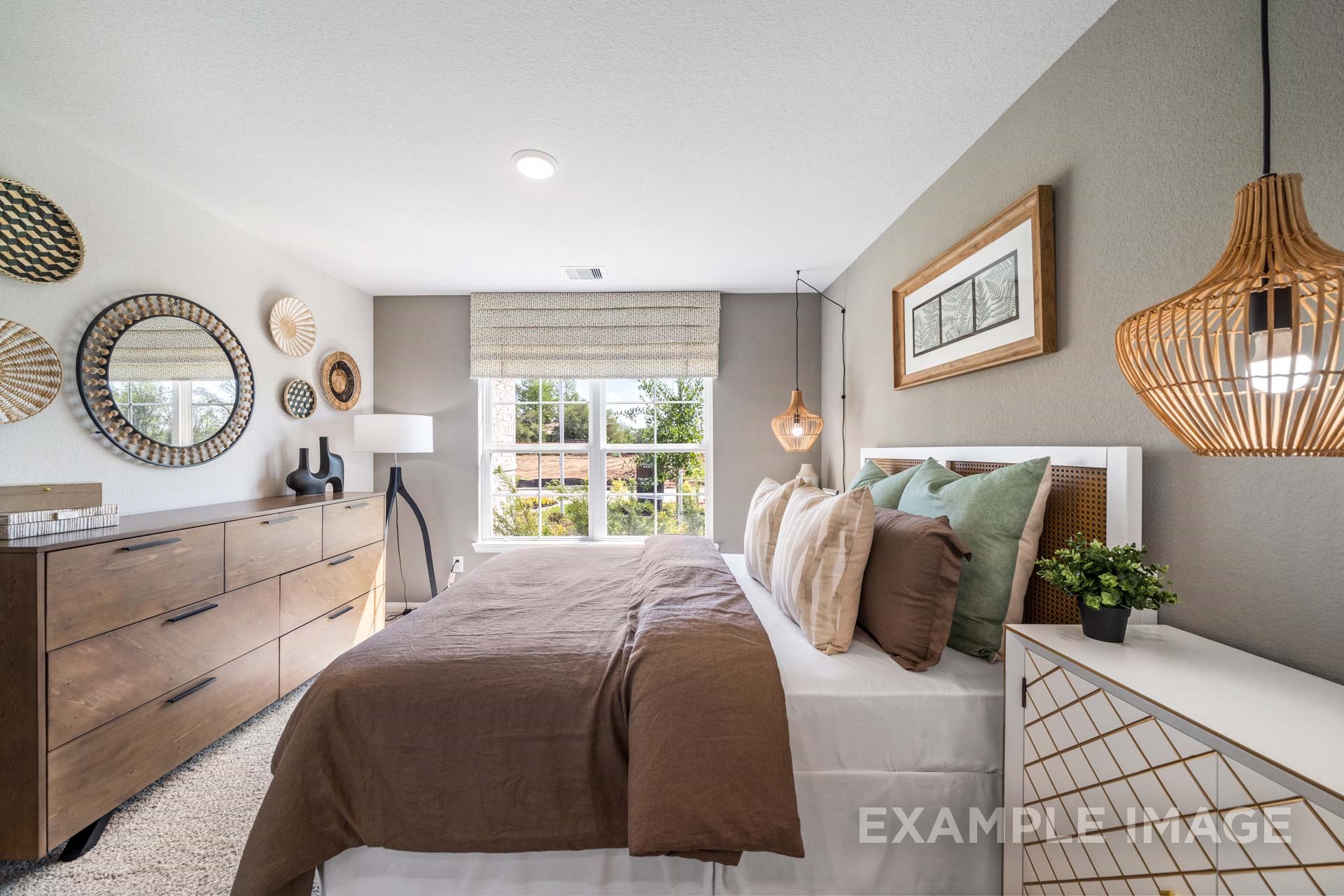 3311 Hidden Mist Drive Texas City, TX 77510 - Photo 26 of 37 a bedroom with a bed a mirror and dresser