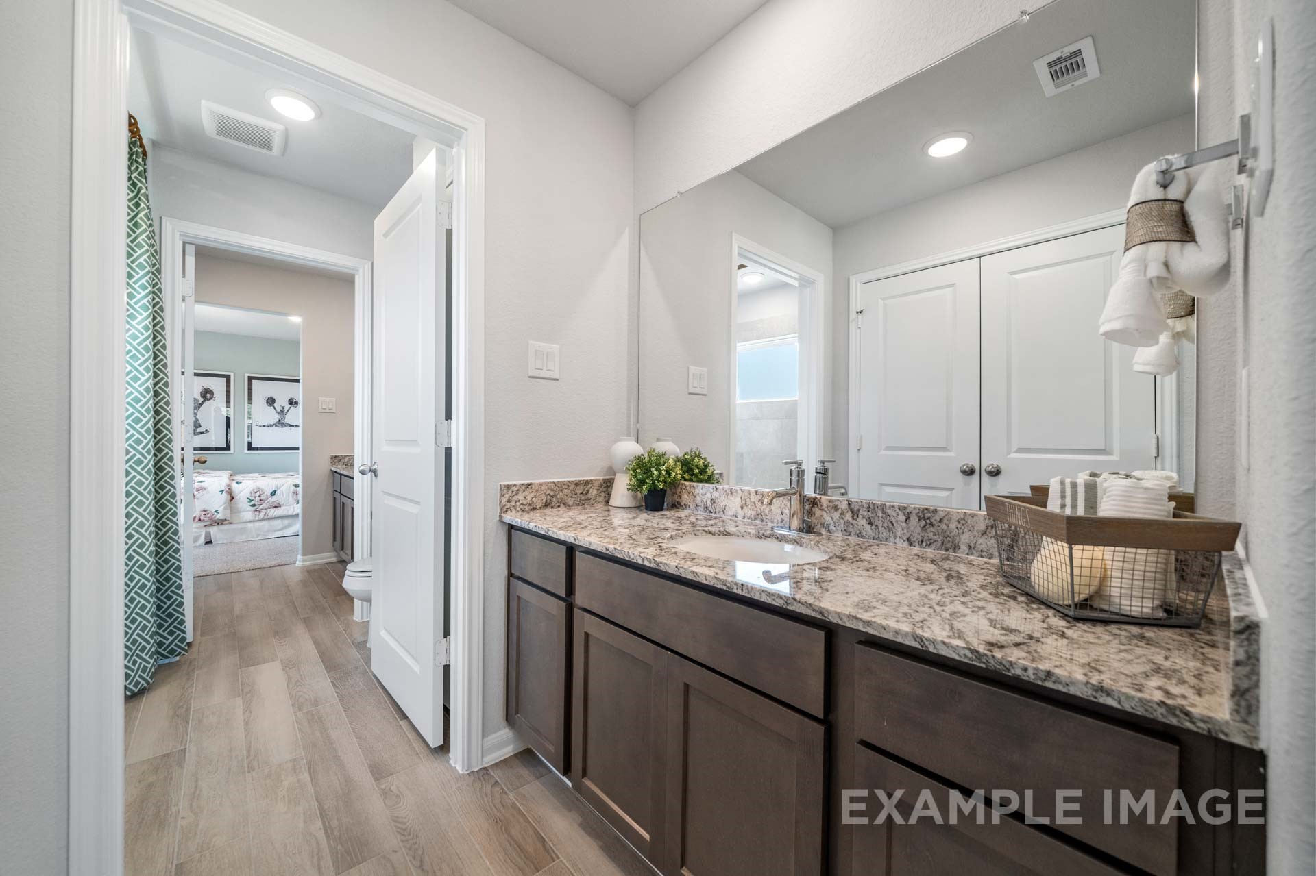 3311 Hidden Mist Drive Texas City, TX 77510 - Photo 27 of 37 a bathroom with sink and mirror