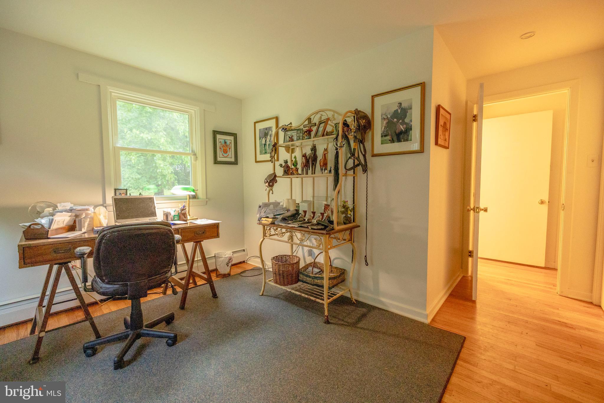540 Doe Run Road Coatesville, PA 19320 - Photo 18 of 35 a view of a workspace with furniture and a window
