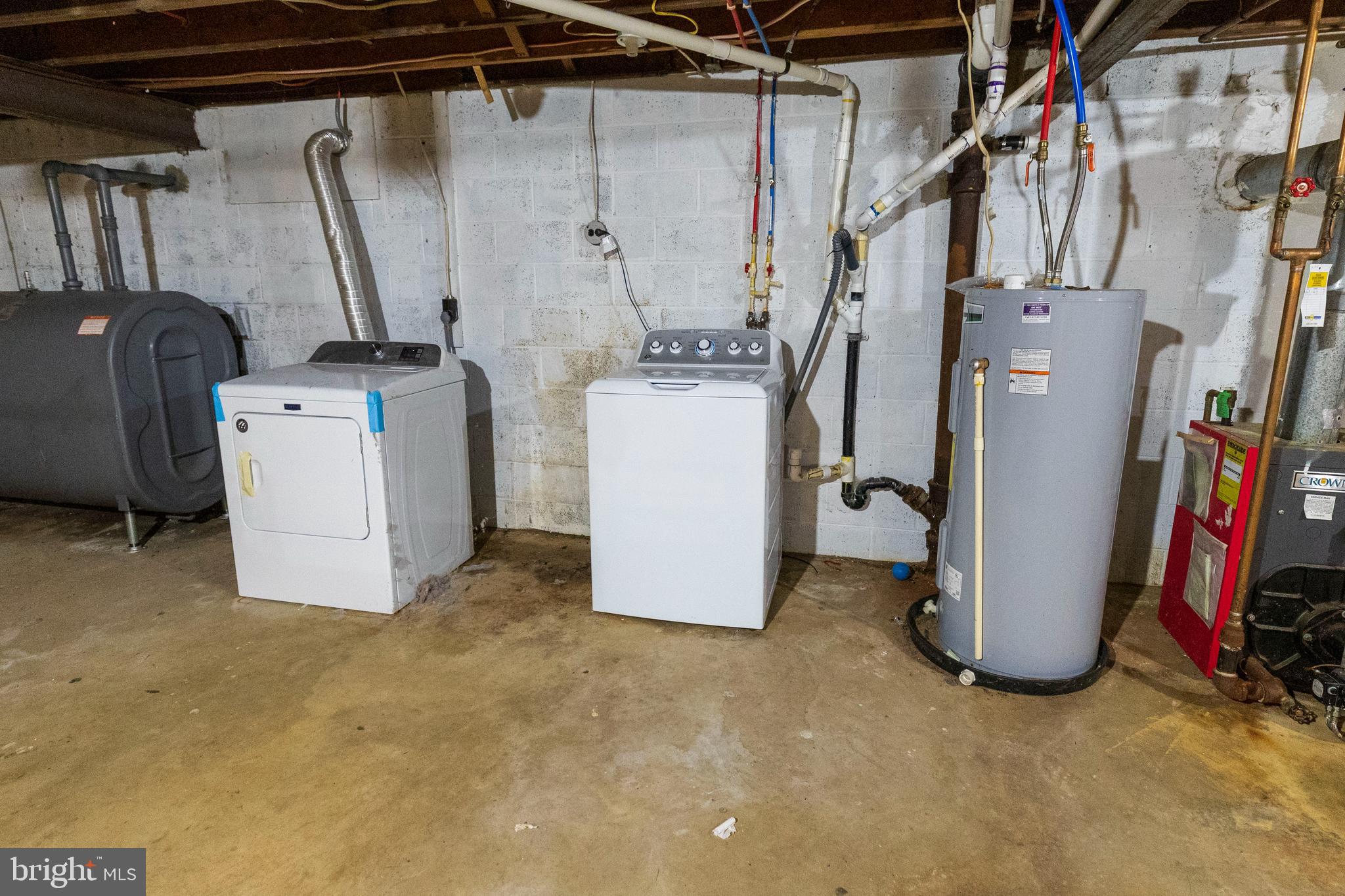 540 Doe Run Road Coatesville, PA 19320 - Photo 25 of 35 a view of a storage room with washer and dryer