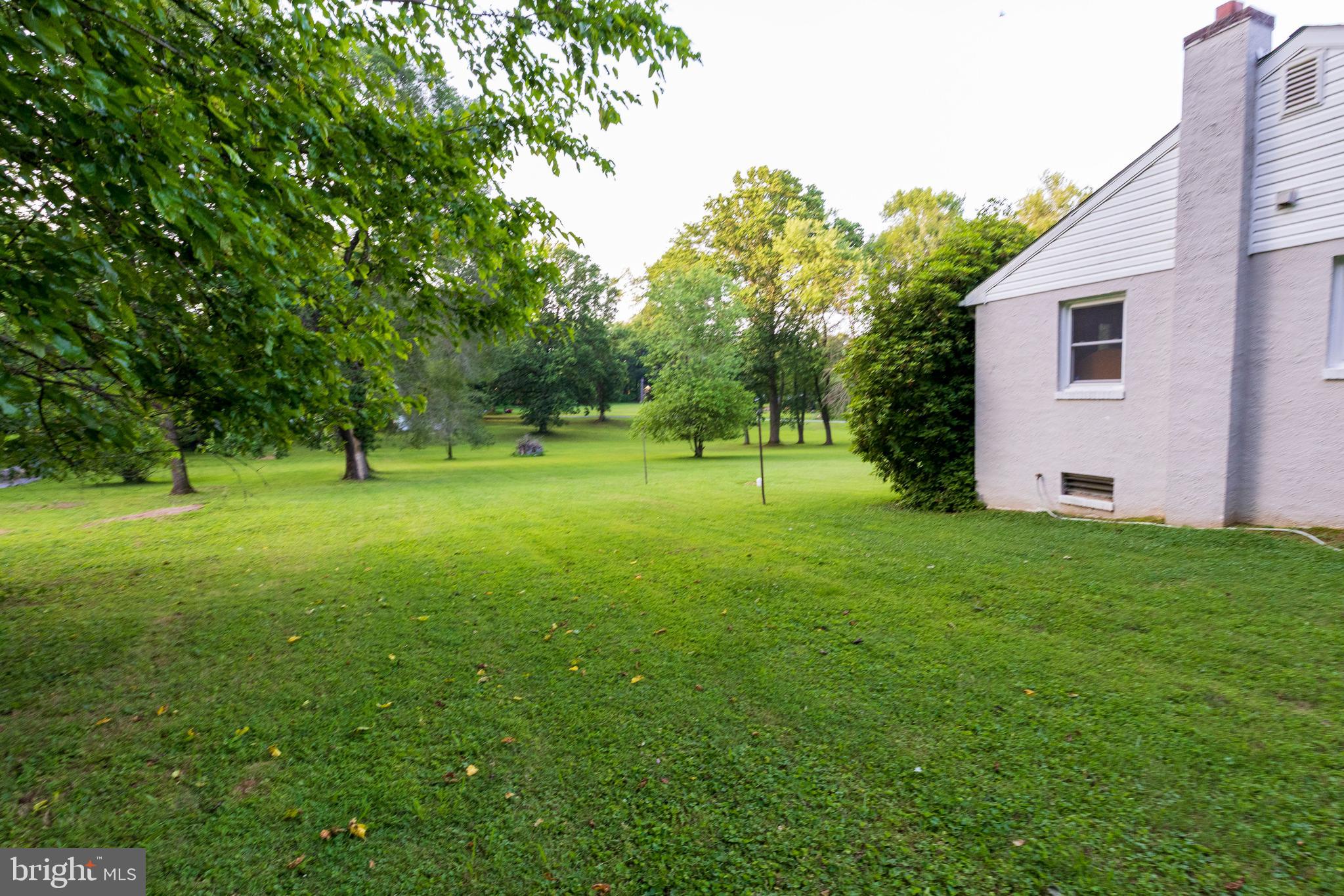 540 Doe Run Road Coatesville, PA 19320 - Photo 27 of 35 a view of outdoor space with deck and yard