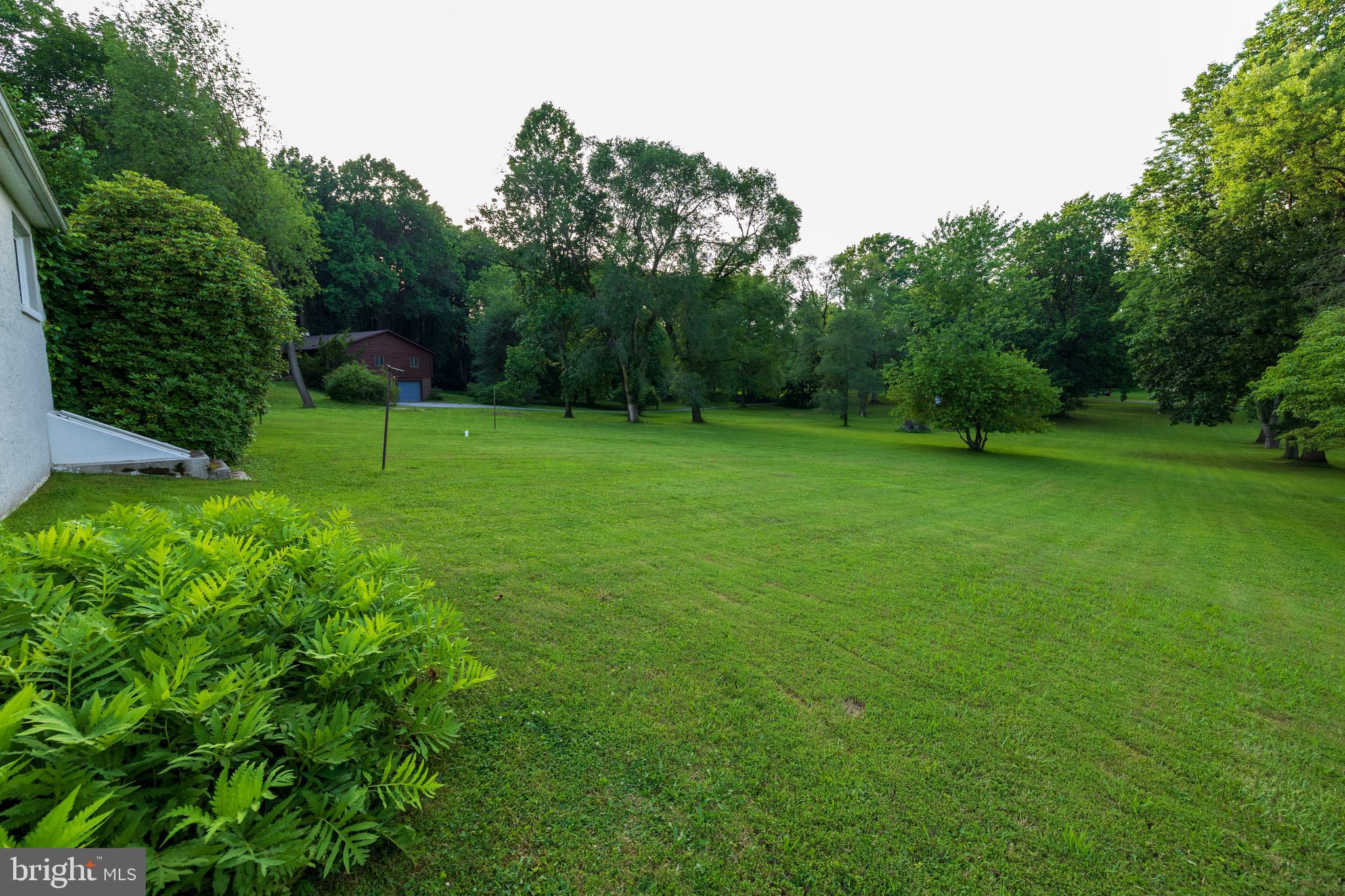 540 Doe Run Road Coatesville, PA 19320 - Photo 31 of 35 a view of field with trees in the background