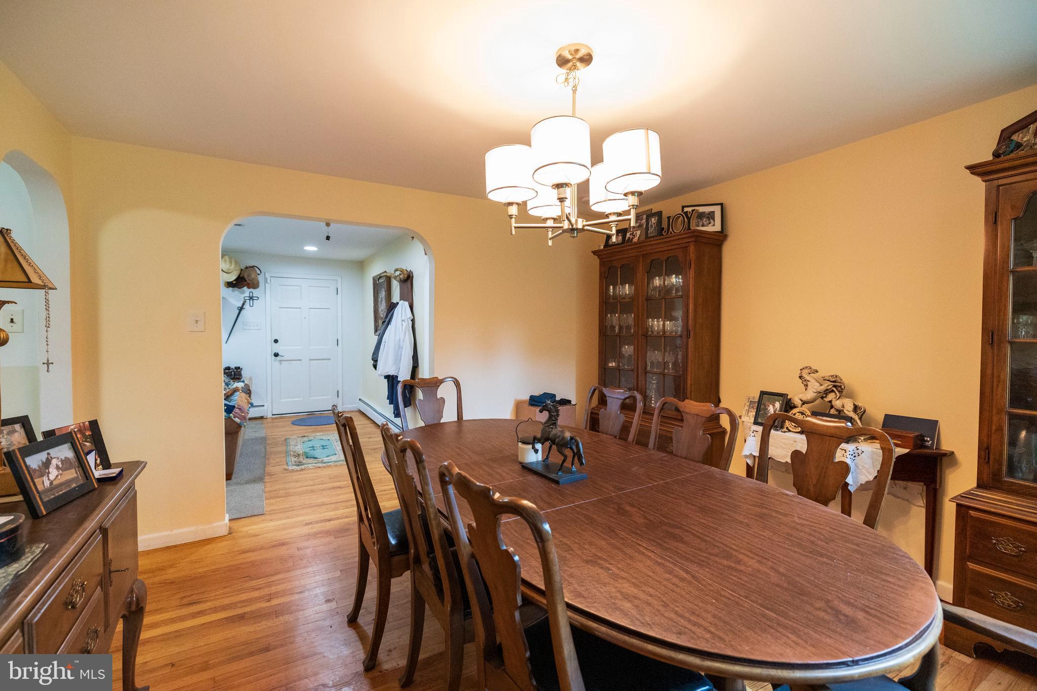 540 Doe Run Road Coatesville, PA 19320 - Photo 4 of 35 a view of a dining room with furniture and wooden floor